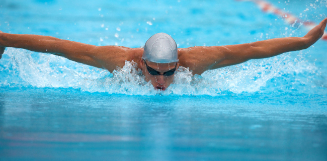 Swimmer in butterfly during a competition
